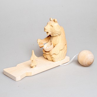Деревянная богородская игрушка  "Мишка ест кашу"